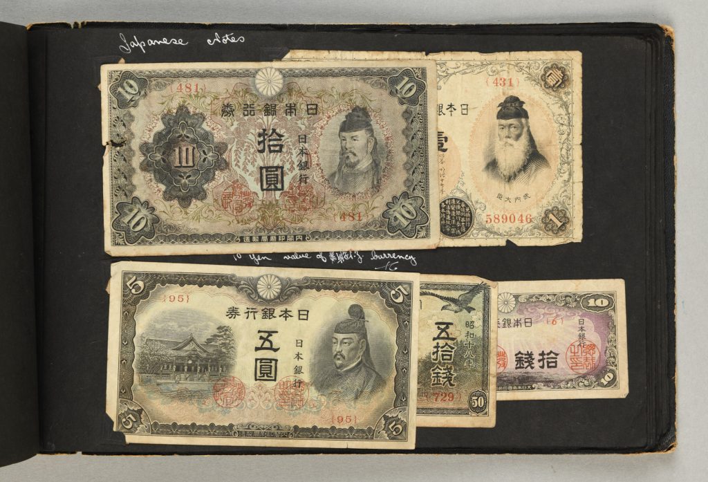 Japanese banknotes in photograph album, from Gordon Graham's collection. (2007.54.2_039)