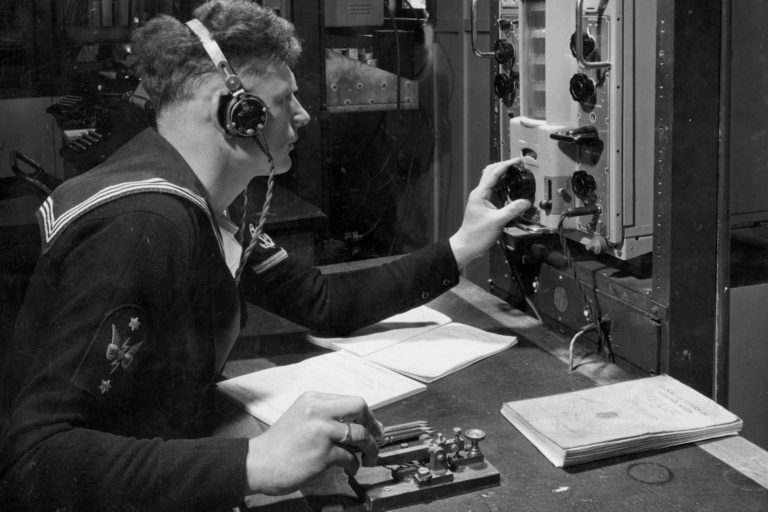 ACB 0043 Irirangi telegraphist at work HMNZS Irirangi telegraphist at work