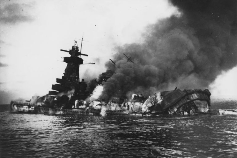 AUG 0133 Graf Spee on fire Smoke billows from Graf Spee as she sinks, 17 December 1939