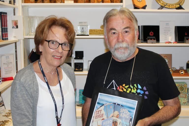 Ann Ann with a Museum Store customer at Torpedo bay Navy Museum