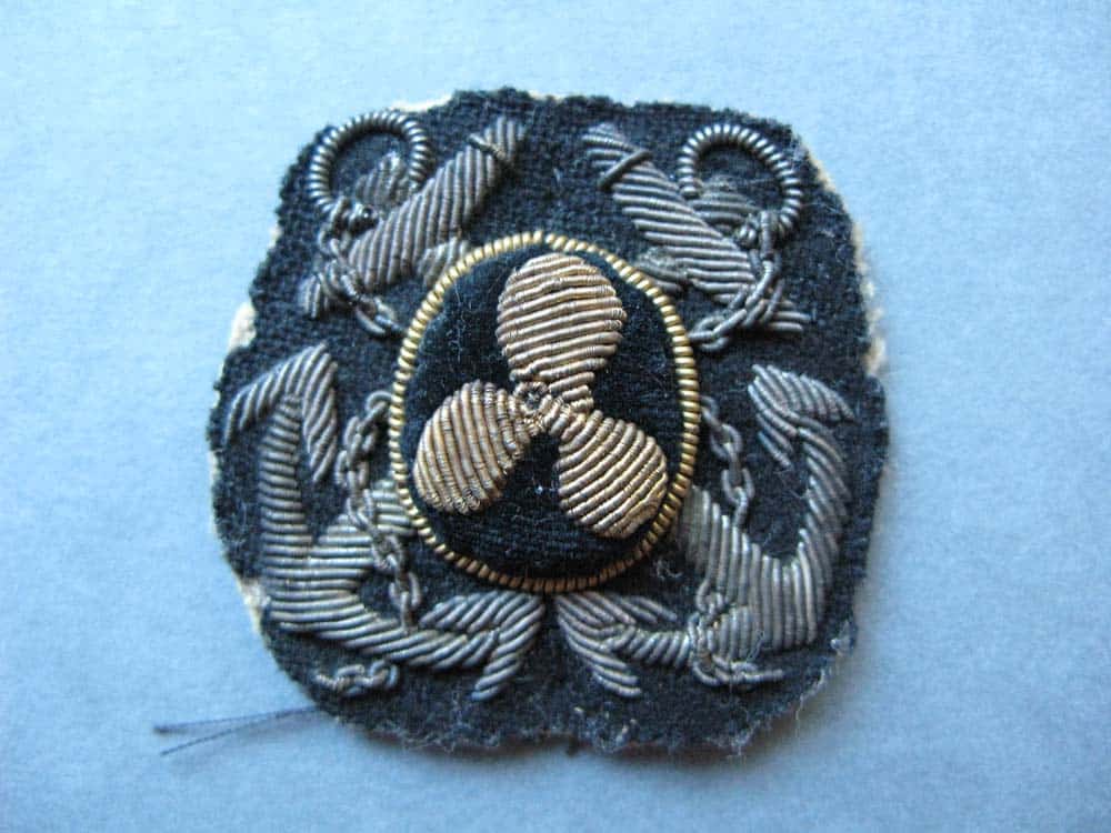 Hat badge of the Motor Boat Section of the Motor Transport Corps worn by C H T Palmer who co-ordinated the Hauraki Gulf motorboatpatrols in the early days of WWI Hat badge of the Motor Boat Section of the Motor Transport Corps worn by C H T Palmer who co-ordinated the Hauraki Gulf motor boat patrols in the early days of WWI
