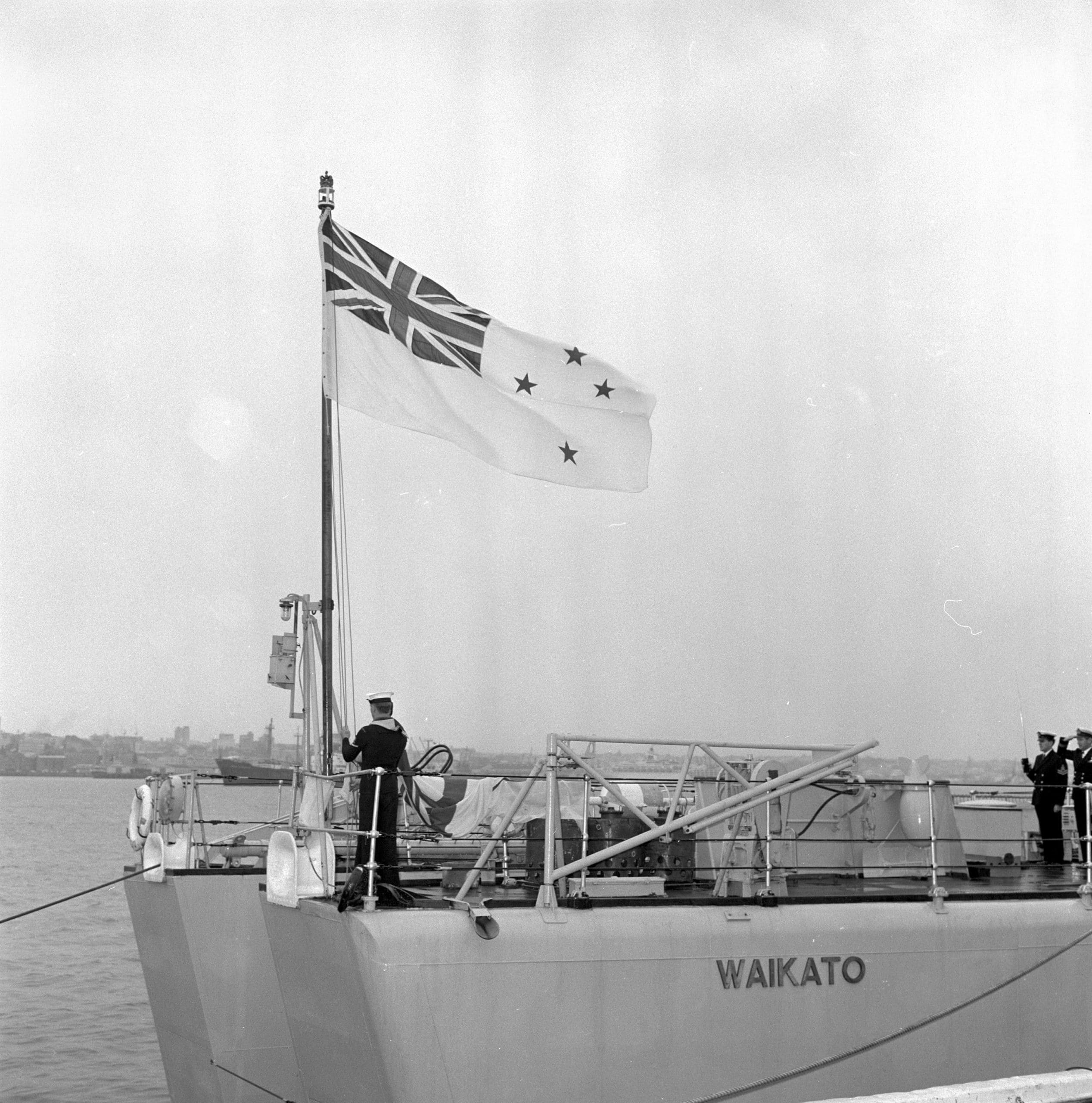 HMNZS Waikato The first time the White Ensign is raised 1966 PN 68 04408 01 HMNZS Waikato raising the White Ensign