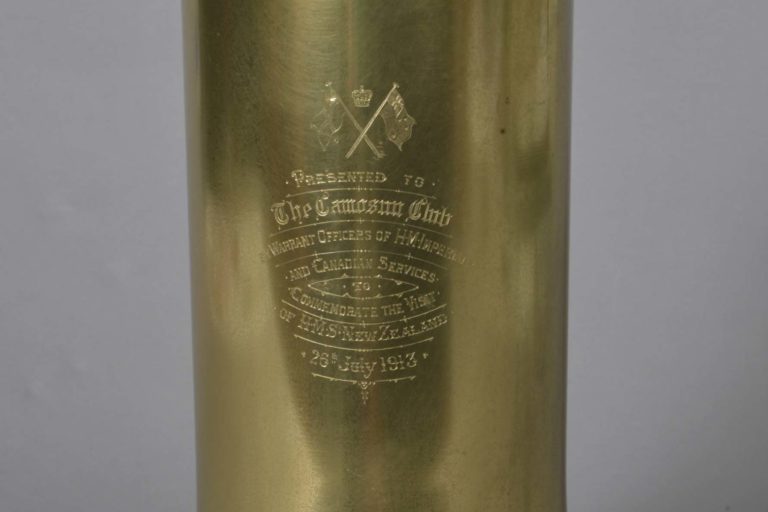 presentation-bell1 Brass presentation bell with clapper. Bell given to the Camosun Club of Victoria, British Colombia, by the Warrant Officers of HMS New Zealand. Inscribed on the bell are the words: ‘Presented to The Camosun Club by Warrant Officers of HM Imperial and Canadian Services to Commemorate the Visit of HMS New Zealand 26th July 1913’.